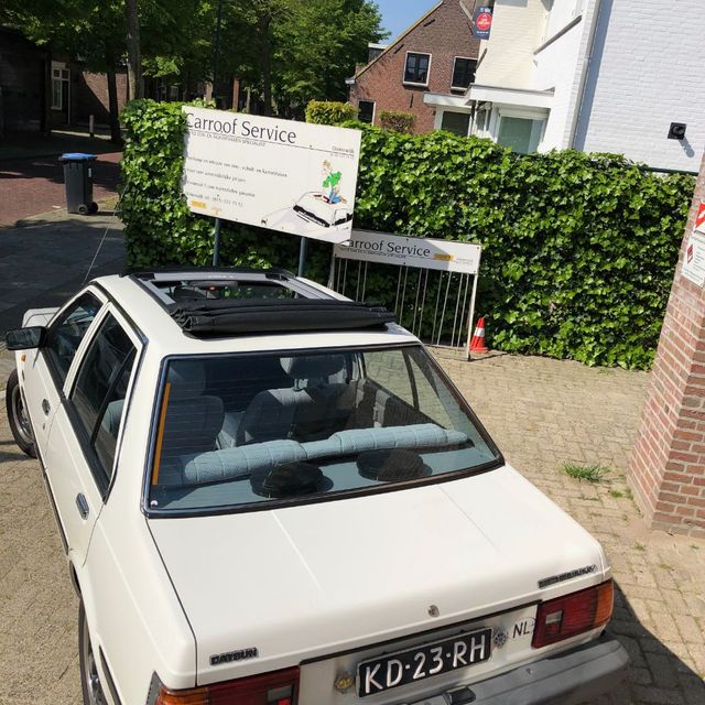 Daksysteem witte oldtimer